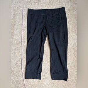 CAbi Black Capri Leggings with Subtle Contrast Stitching